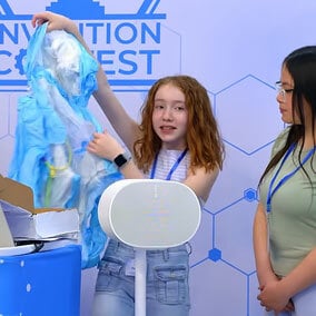 students presenting an invention